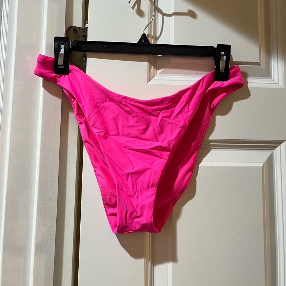 Brand new w/tag bikini bottom. Too small for me, never took back to Dillards.